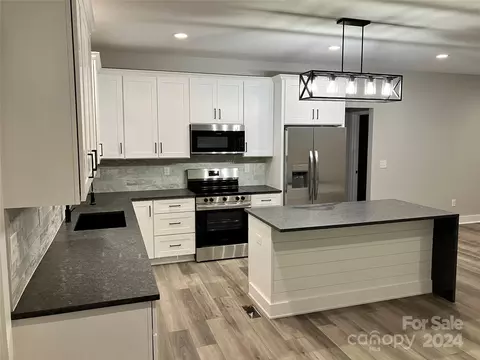 Kitchen - 976 Tabor Rd, Olin, NC 28660 photo 2 of 4