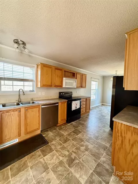 Kitchen - 191 Ashford Dr, Olin, NC 28660 photo 2 of 3