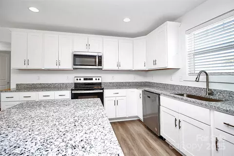 Kitchen - 1235 E Poplar St, Conover, NC 28613 photo 4 of 5