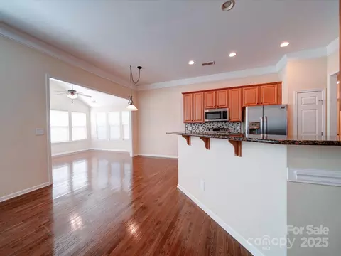 Living - 7524 Common Oak Dr, Stanley, NC 28164 photo 4 of 9