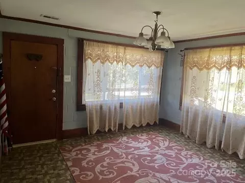 Living - 1600 Whitesides Rd, Mill Spring, NC 28756 photo 2 of 2