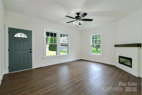 Living - 307 E 2nd St, Lowell, NC 28098 photo 2 of 4