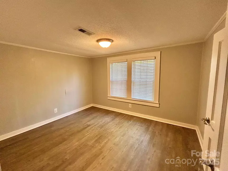 Bedroom - 121 W 11th St, Oakboro, NC 28129 photo 1 of 3