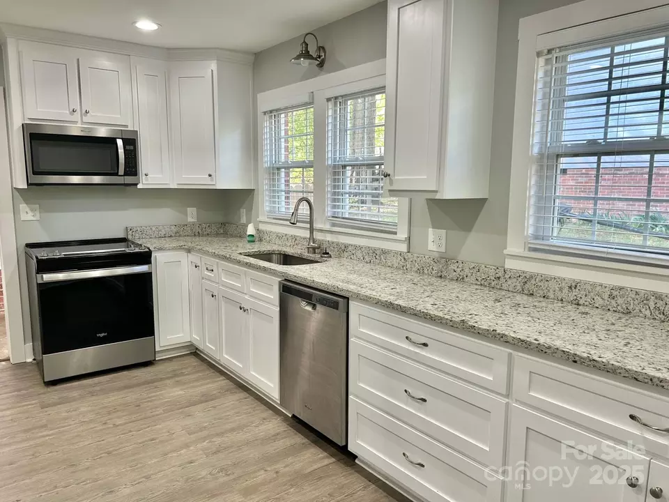 Kitchen - 121 W 11th St, Oakboro, NC 28129 photo 2 of 2