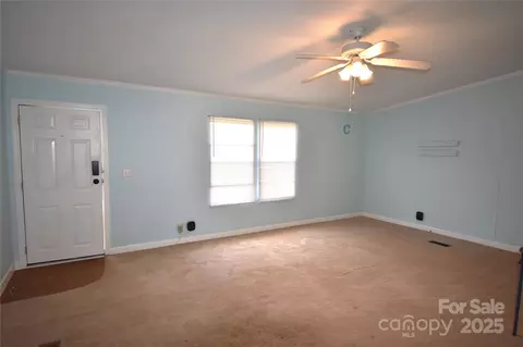 Living - 234 Olin Loop, Olin, NC 28660 photo 1 of 3