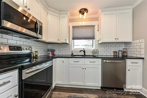 Kitchen - 202 Hickory St, Locust, NC 28097 photo 3 of 4