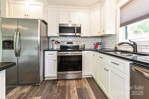 Kitchen - 202 Hickory St, Locust, NC 28097 photo 4 of 4