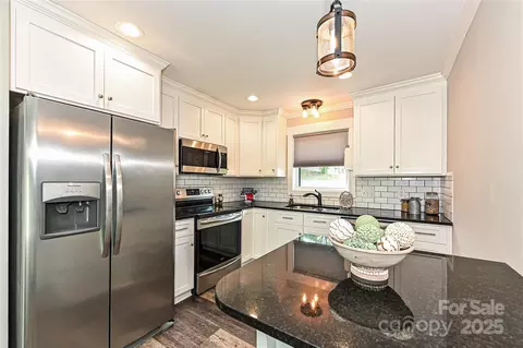 Kitchen - 202 Hickory St, Locust, NC 28097 photo 2 of 4
