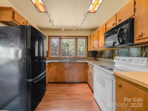 Kitchen - 177 Fowler Rd, Mill Spring, NC 28756 photo 3 of 3
