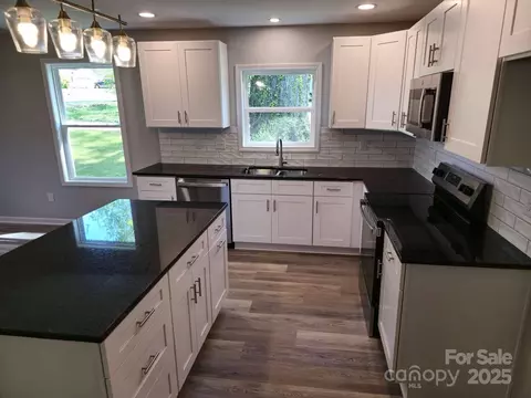 Kitchen - 901 3rd St, Spencer, NC 28159 photo 3 of 4