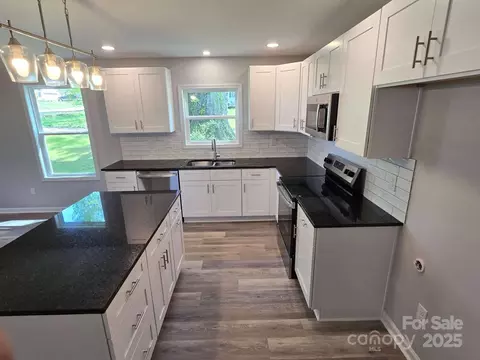 Kitchen - 901 3rd St, Spencer, NC 28159 photo 2 of 4