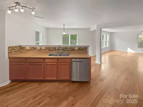 Living - 1152 Wind Chime Ct, Monroe, NC 28110 photo 8 of 11