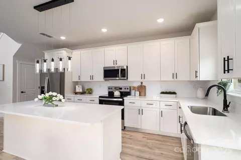 Kitchen - 207 9th Ne Ct NE, Conover, NC 28613 photo 2 of 3