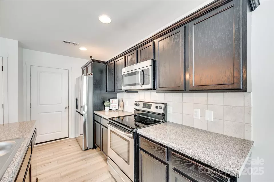 Kitchen - 5228 Tomsie Efird Ln, Charlotte, NC 28269 photo 3 of 3