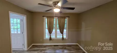 Living - 221 Flat Branch Trl, Mill Spring, NC 28756 photo 3 of 3