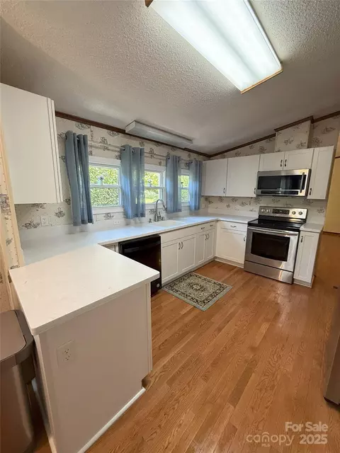 Kitchen - 400 Archibald Rd, Concord, NC 28025 photo 2 of 4