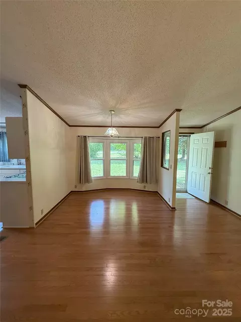 Living - 400 Archibald Rd, Concord, NC 28025 photo 3 of 4