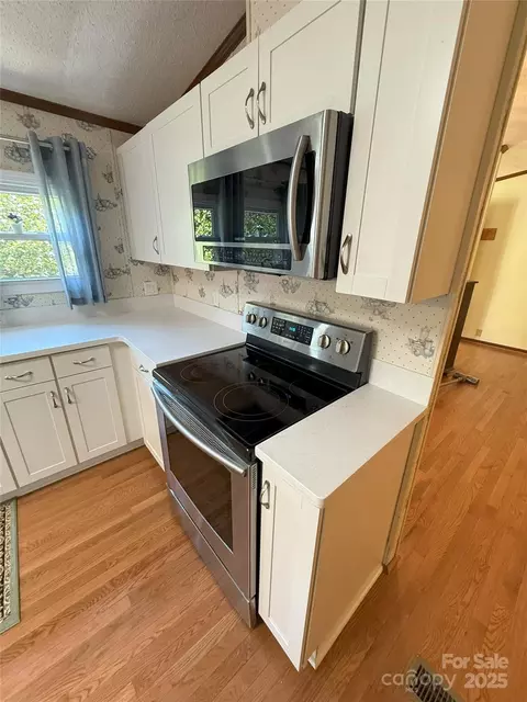 Kitchen - 400 Archibald Rd, Concord, NC 28025 photo 3 of 4