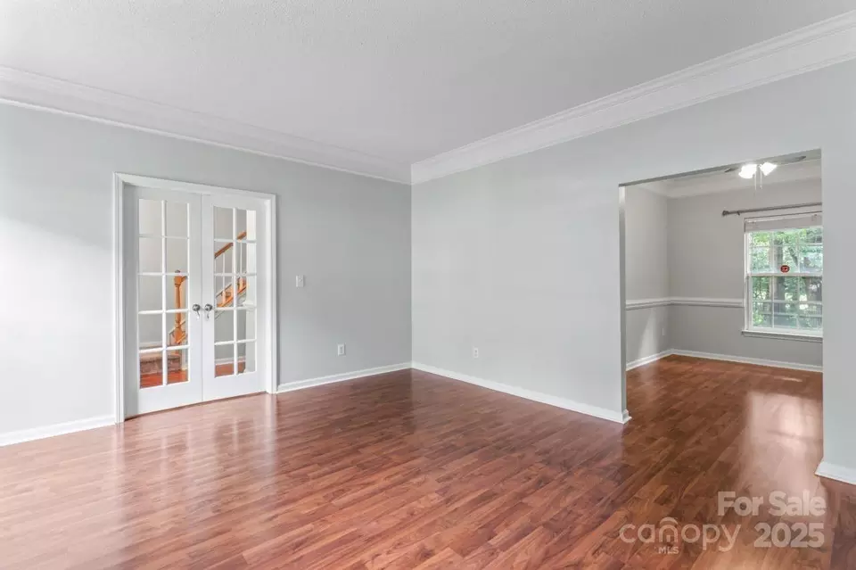 Living - 9830 Dauphine Dr, Charlotte, NC 28216 photo 6 of 9