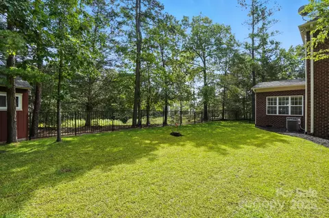 Exterior - 1651 Scotch Pine Ln, Tega Cay, SC 29708 photo 11 of 12
