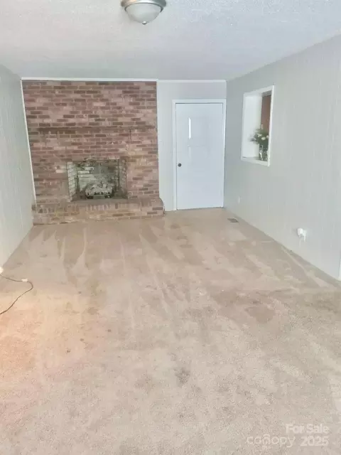 Living - 415 E Poplar St, Stanley, NC 28164 photo 4 of 6