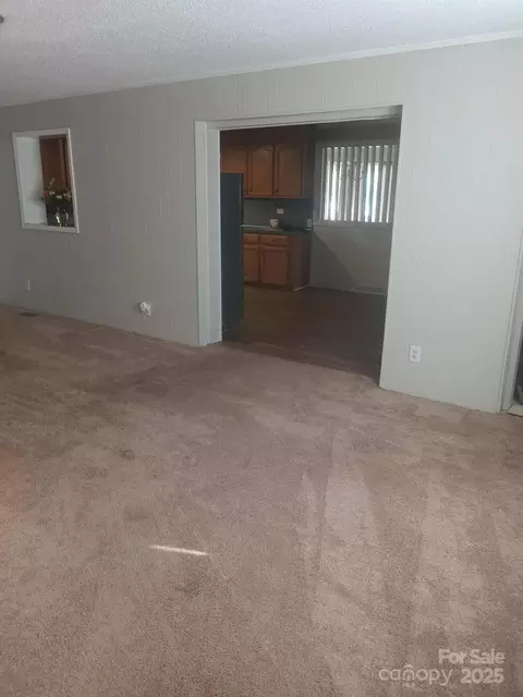 Living - 415 E Poplar St, Stanley, NC 28164 photo 5 of 6