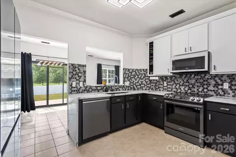 Kitchen - 8836 Cornwall St, Locust, NC 28097 photo 2 of 3