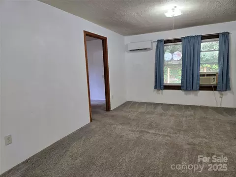 Living - 148 Huffman Rd, Clyde, NC 28721 photo 12 of 13