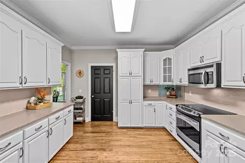 Kitchen - 6750 Plain View Rd, Monroe, NC 28110 photo 3 of 3