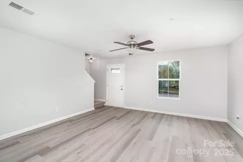 Living - 1160 Tangle Ridge Se Dr SE, Concord, NC 28025 photo 3 of 4