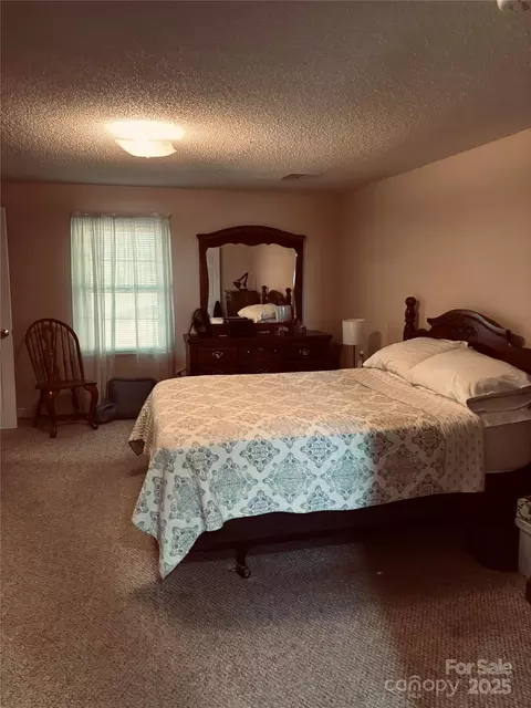 Bedroom - 4211 Wolf Pond Rd, Monroe, NC 28112 photo 2 of 7