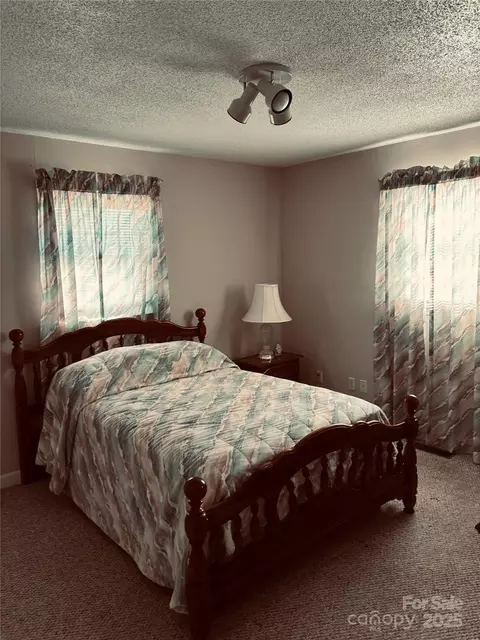 Bedroom - 4211 Wolf Pond Rd, Monroe, NC 28112 photo 6 of 7
