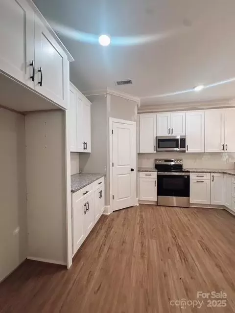 Kitchen - 716 Mclarty 4 St #4, Monroe, NC 28112 photo 2 of 2