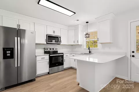 Kitchen - 333 E Village Dr, Monroe, NC 28112 photo 2 of 3
