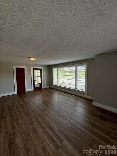 Living - 509 E Main E St E, Locust, NC 28097 photo 4 of 5