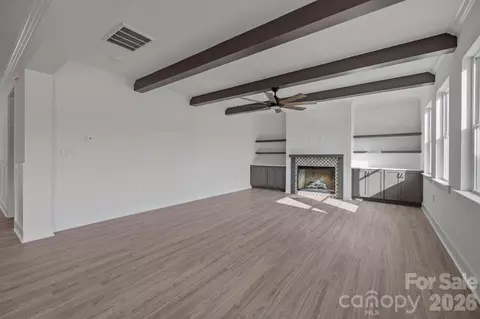 Living - 2435 Wolf Pond 2 Rd #2, Monroe, NC 28112 photo 2 of 3