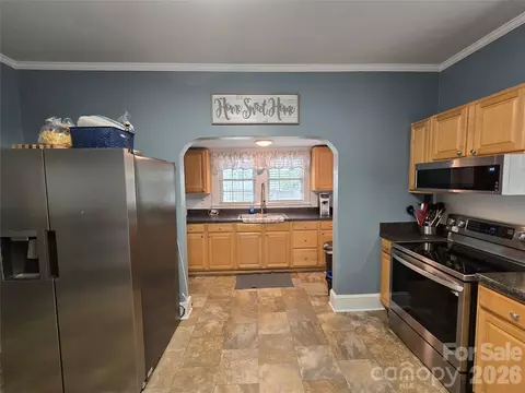 Kitchen - 214 E 10th St, Kannapolis, NC 28083 photo 2 of 2