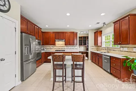 Kitchen - 10331 Falling Leaf Nw Dr NW, Concord, NC 28027 photo 2 of 3