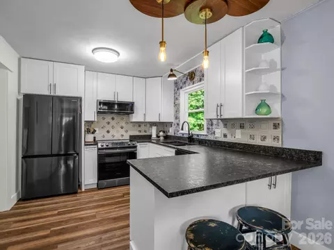 Kitchen - 395 E Howard St, Tryon, NC 28782 photo 3 of 5