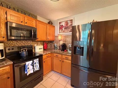 Kitchen - 110 E Pine St, Maiden, NC 28650 photo 2 of 2