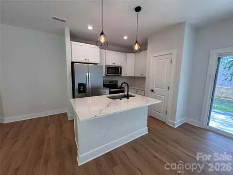 Kitchen - 1006 John St, Monroe, NC 28110 photo 3 of 4
