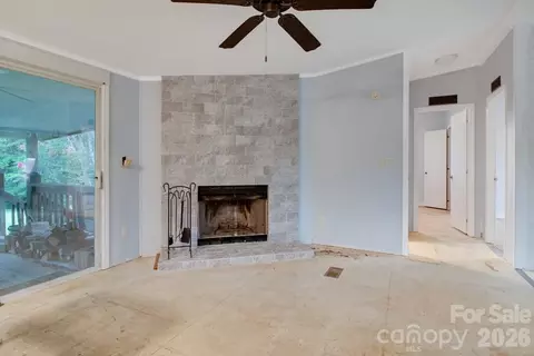Living - 1474 Pea Ridge Rd, Mill Spring, NC 28756 photo 2 of 3