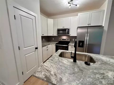 Kitchen - 1010 John 4 St #4, Monroe, NC 28110 photo 3 of 4