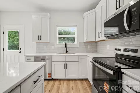 Kitchen - 310 Talleyrand Ave, Monroe, NC 28112 photo 2 of 2