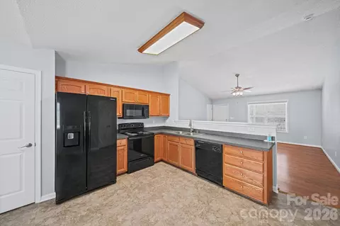 Kitchen - 2425 Red Tip Se Dr SE, Concord, NC 28025 photo 2 of 3
