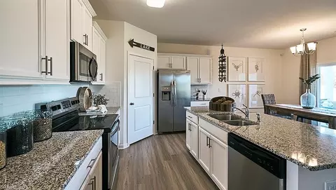 Kitchen - 8590 Cripple Gate Trce, Browns Summit, NC 27214 photo 4 of 4