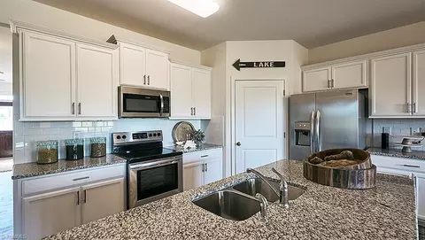 Kitchen - 8590 Cripple Gate Trce, Browns Summit, NC 27214 photo 3 of 4