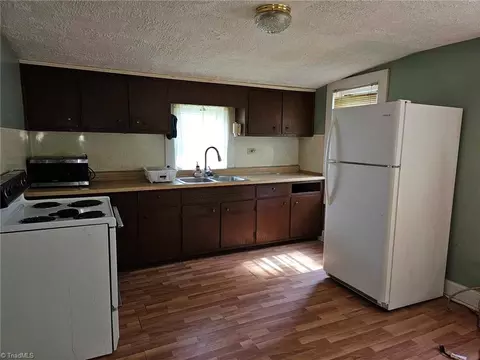 Kitchen - 10167 Pine St W, Lowgap, NC 27024 photo 2 of 2