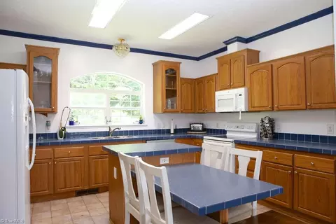 Kitchen - 1212 Yates Rd, Denton, NC 27239 photo 4 of 7