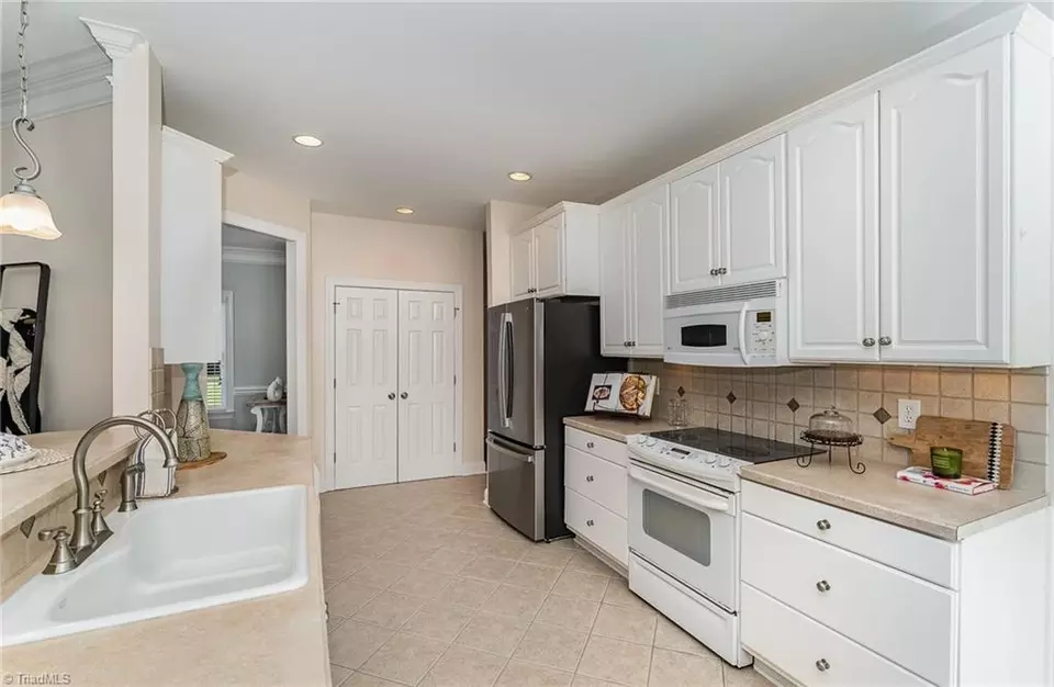Kitchen - 7403 Greenlawn Dr, Summerfield, NC 27358 photo 2 of 4